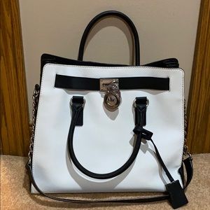 Michael Kors black and white tote bag.